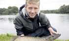 Tom Kiddy, 15, with his catch of the day. Photograph: David Sillitoe