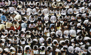  Malaysian children reading in the 'Read 2008' read-a-thon at a school in Putrajaya outside Kuala Lumpur. Photograph: Bazuki Muhammad/Reuters 