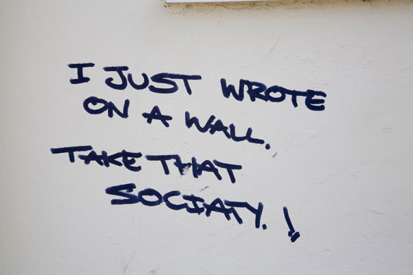 Toilet graffiti: Graffiti on the wall of public toilet in Whitstable Kent 