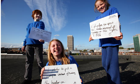Cole, Molly and Josie at Fox school, London, with their 10:10 pledges to help save the environment