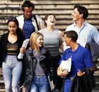Group of college students walking down steps