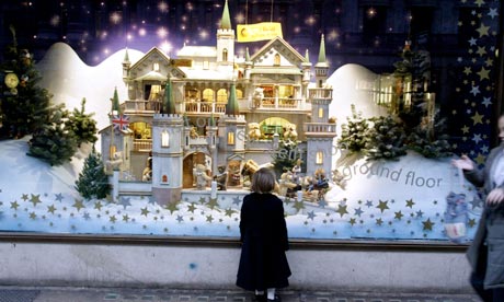 All I want for Christmas ... a child gazes at a toy shop window