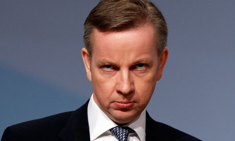 Michael Gove listens to applause