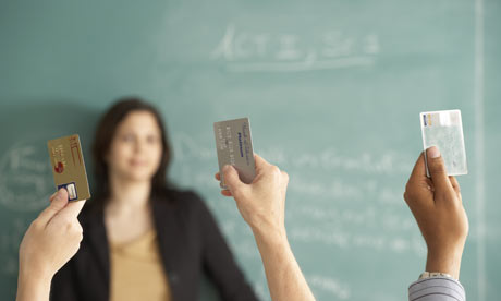 Students holding credit cards in the air, student debt,  graduate debt