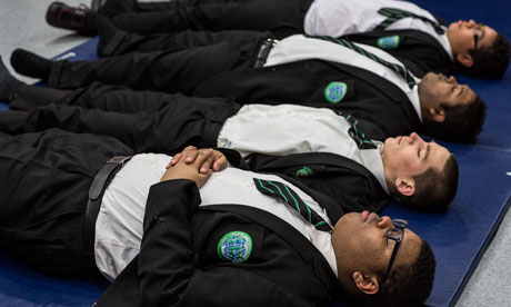 Pupils practise relaxation at Bethnal Green academy. Now teachers are getting in on the act, too