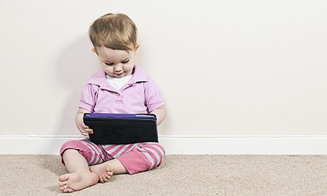 baby girl using ipad