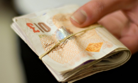 Cash in hand/ Handing money / giving money. Image shot 2008. Exact date unknown.