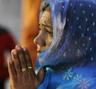 A Sikh devotee prays at the Golden Temple, Sikhism's holiest shrine