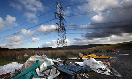 Pollution : Rubbish litters and electricity pylons at Ffos-Y-Fran opencast coal mine