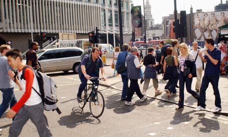 Bike blog: A cyclist ignores the red light at a pedestrian crossing in central London
