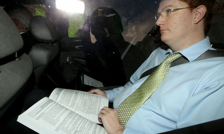 Danny Alexander with a draft copy of the Comprehensive Spending Review