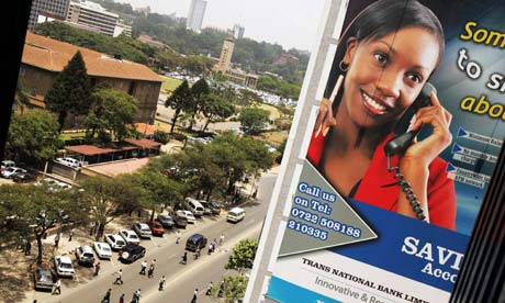 MDG: Broadband in Africa : An advertisement billboard showing a woman talking on a phone  , Kenya