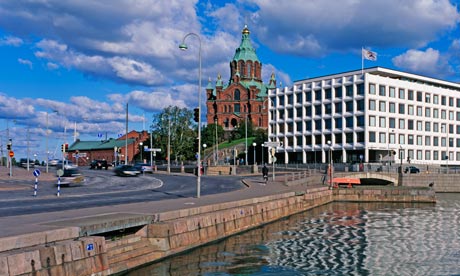 The Uspensky Cathedral behind office building in Helsinki, Finland