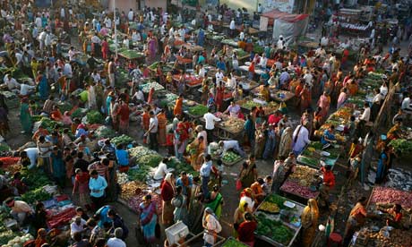 MDG: Food crisis : Customers shop at  market in the western Indian city of Ahmedabad
