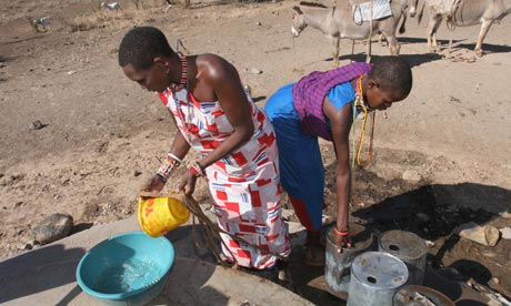 Maasai women collect water