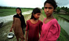 MDG : Rural girls :  collecting water at Muhu Rijara village,