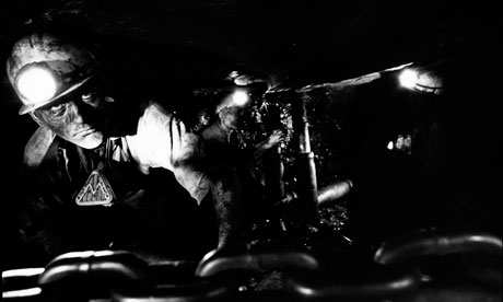 Damian blog on coal versus carbon tax : A miner working in a coal mine