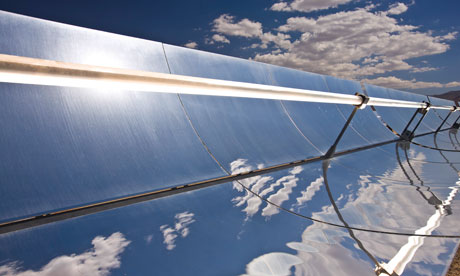 Parobolic mirrors at a solar thermal plant are used to heat oil