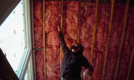 Green deal : Installing Fiberglass Insulation