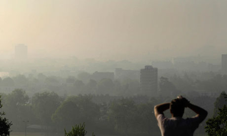 Air pollution in UK : smog covering central London from Parliament Hill