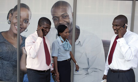 MDG : Botswana Diamond Industry : African businessmen on their mobile phones