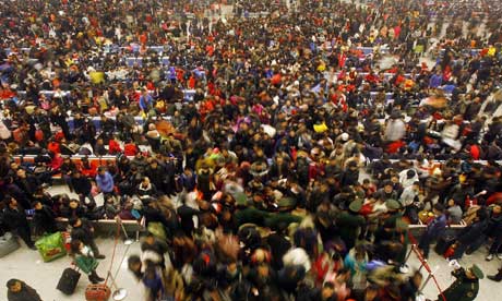 MDG : Population : thousands of passengers  at Wuhan railway station, Hubei, China