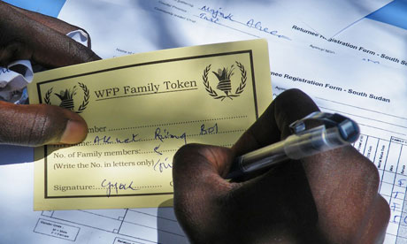 MDG : South Sudan Aid : WFP food tokens distributed by IOM at Turalei