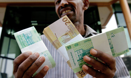 MDG : Cancelling debt : Sudan issues new currency