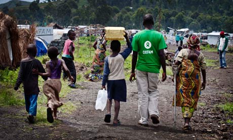 MDG : Aid agencies and aid workers in conflict zone, Oxfam in  IDP camp in Goma, DRC
