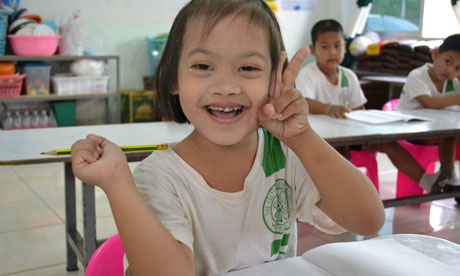 MDG : Thailand disability : Nuey, a six year old girl born with Downs Syndrome