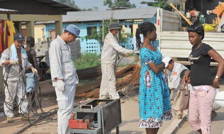 MDG : China in Africa : Chinese labourers working on electrical grid in Bata, Equatorial Guinea