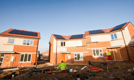Green economy :  housing development with zero carbon houses with solar panels 