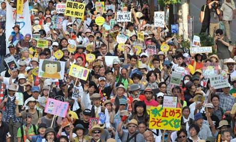 Anti-nuclear activists protest against nuclear power plant in front of Japan parliament in Tokyo