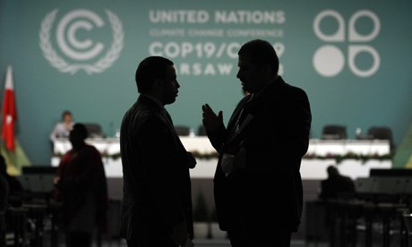 COP19 in Warsaw : Delegates talk during a break in a plenary session