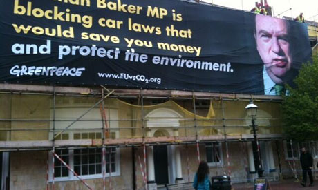Greenpeace activists highlight the fact that Norman Baker MP opposed laws that make new cars cleaner