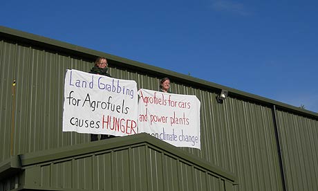 Protesters mount the roof at the European Biofuels Expo in Nottinghamshire