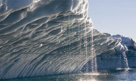 Melting water streams from iceberg calved from Ilulissat Kangerlua Glacier, Greenland