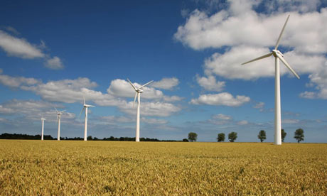 erosion by wind. Wind turbines in a wheat field