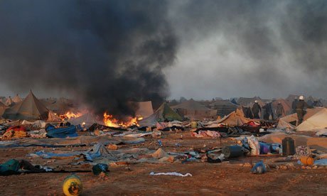 Moroccan forces dismantle the protest camp near Laayounce in 2010