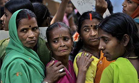 Activists take part in an International Women's Day march in New Delhi