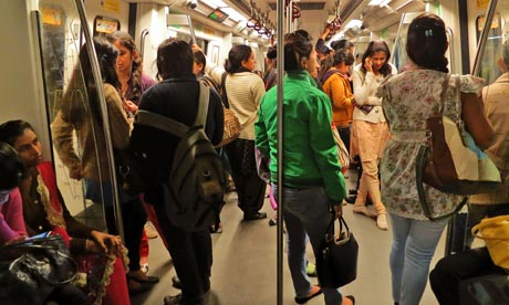 Indian women travel inside a ‘women only’ metro train compartment in Delhi