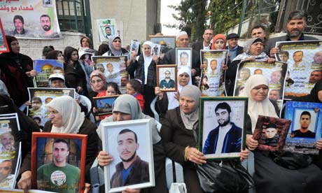 Palestinians protest outside the International Red Cross offices