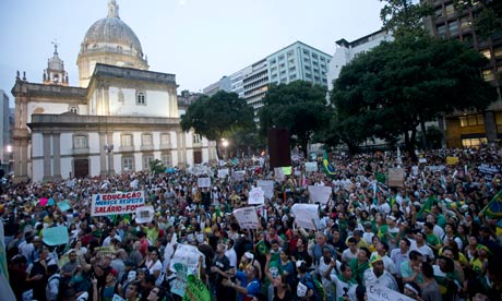 People gather for an anti-government protest in Rio