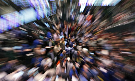 Traders work in the crude oil and natural gas options trading pit , New York Mercantile Exchange