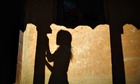 MDG : Chaupadi in Nepal : shadow of Uttara Saud is cast the wall of her house in Achham District