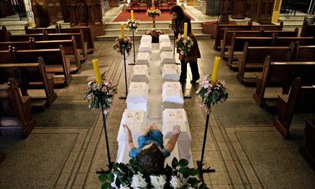 MDG : Anti- abortion display of coffins containing foetuses in a church in Chile