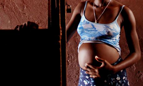 MDG : Denmark bans adoption from Nigeria : Pregnant woman in one the slums of Lagos