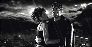 Rosario Dawson and Clive Owen in Sin City