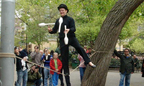 Philippe Petit performing in Washington Square Park 2008