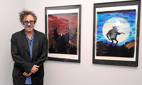 Tim Burton with some of his works included in Moma's retrospective